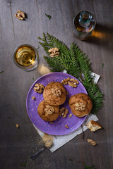 Walnut cookies, freshly backed on a plate and a glass of wine. Romantic evening dessert. Top view, copy space.