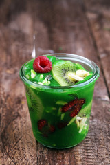 breakfast smoothie bowl with raspberries, kiwi and chia - diet concept