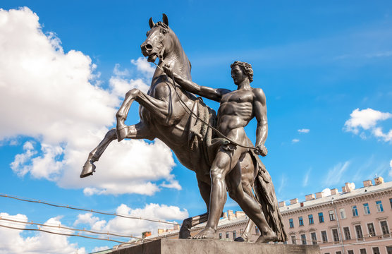 Sculpture tamer of horses, designed by the Russian sculptor Baron Peter Klodt.  Anichkov bridge, St. Petersburg, Russia, 1841