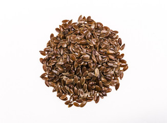 Healthy flax seeds on a white background