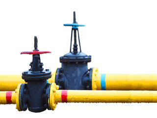 Old yellow gas pipes and valves isolated on white background