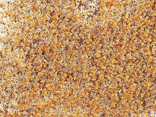 Uniform caramel candy background, baked sugar