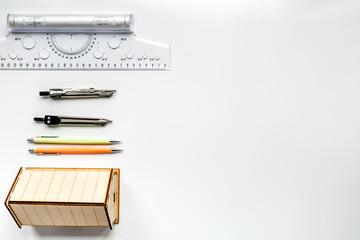 Construction office with architect tools on white background top view mockup