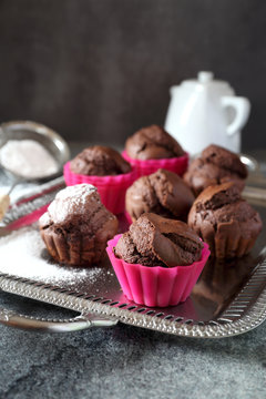 Chocolate muffins on vintage tray