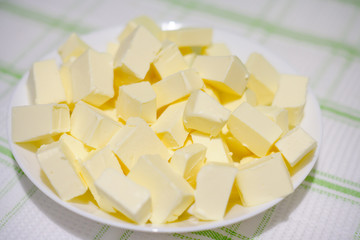 Lots of butter, cut into pieces