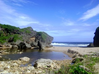 Hidden Beach, Saipan Located in Talafofo, the Hidden Beach is one of Saipan’s gems with lovely cliffs and stone formations. 