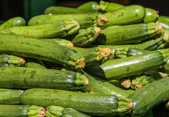 Light green fresh zucchini stacked