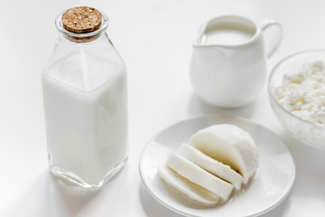 Fresh dairy products on white desk background