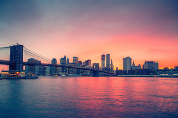 Fototapeta na wymiar Brooklyn bridge and Manhattan at sunset, New York City