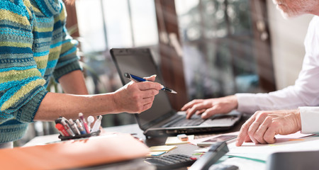 Senior manager working with executive assistant