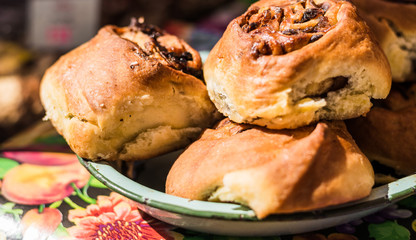 Cinnamon roll buns with raisins at a street food market