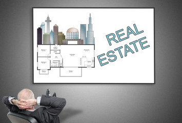 Businessman looking at real estate concept