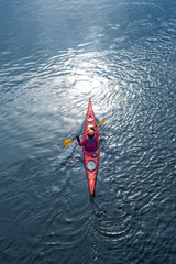 Kayaking on the river in the city near the shore 09 © serguastock
