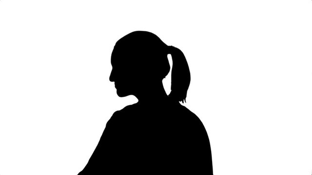 Silhouette Young businesswoman dancing.