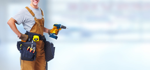 Construction worker with drill