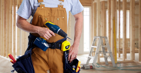 Construction worker with drill