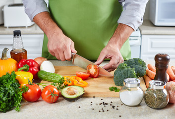 Chef man cooking in the kitchen.