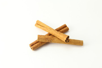 Cinnamon sticks on white background. Top view