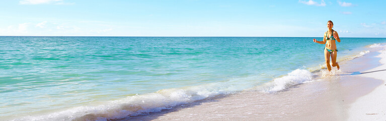 Woman running on the beach