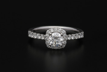 Diamond ring on black background
