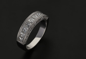 Diamond ring on black background