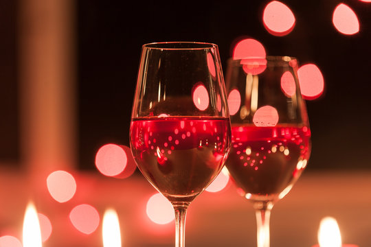 Wine and romance.  Romantic candle light dinner. 