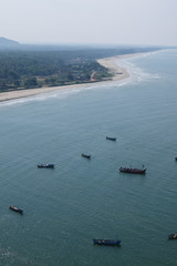 Ocean coast view in Murdeshwar, fisherman boats
