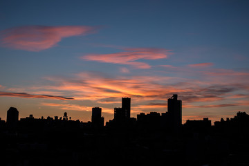 Fototapeta na wymiar Sunset over city