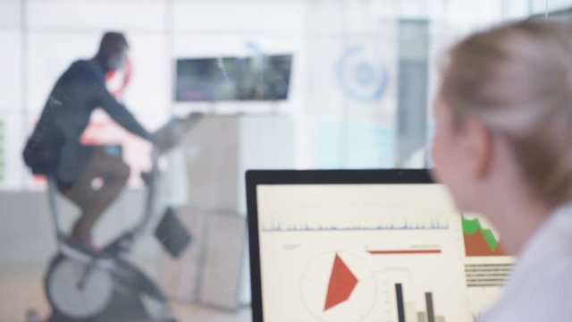  Athlete in science research program being tested by scientists in hi tec lab. 