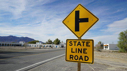 road sign by California/Nevada boarder in Death Valley Junction.