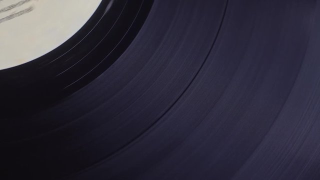 Old vinyl turntable playing music