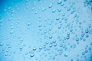 Water drops on blue background.