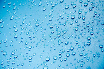 Water drops on blue background.