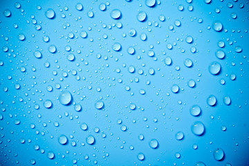 Water drops on blue background.