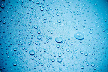 Water drops on blue background.