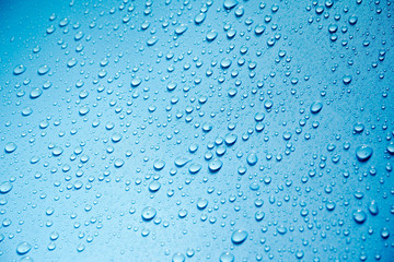 Water drops on blue background.