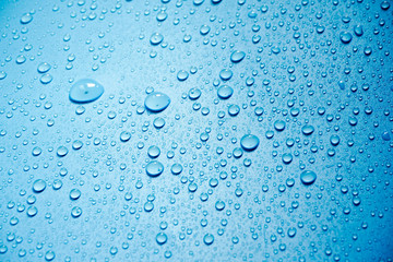 Water drops on blue background.