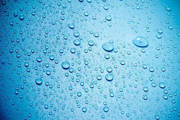 Water drops on blue background.