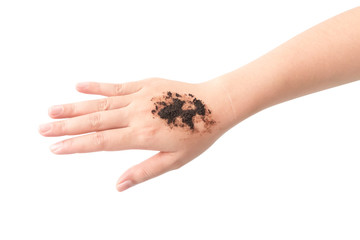 Woman's hand with scrub coffee grounds, beauty and healthy care concept