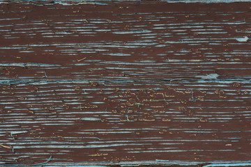 old paint on a wooden surface
