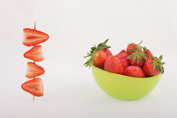 strawberries in a green bowl