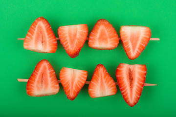 strawberries on a green background