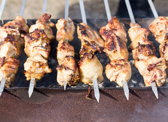 Meat on the grill in the open air