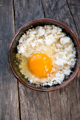 Raw egg mixed with cheese