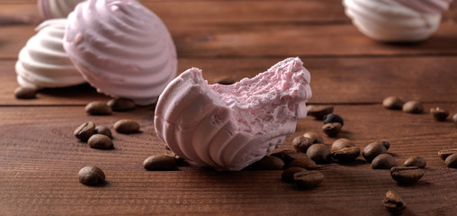 White and pink zephyr with coffee