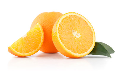 Fresh oranges with leaves