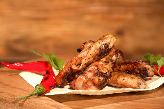 Delicious Grilled Chicken Meat With Grilled Vegetables On A Pita Bread Placed On A Wooden Background.