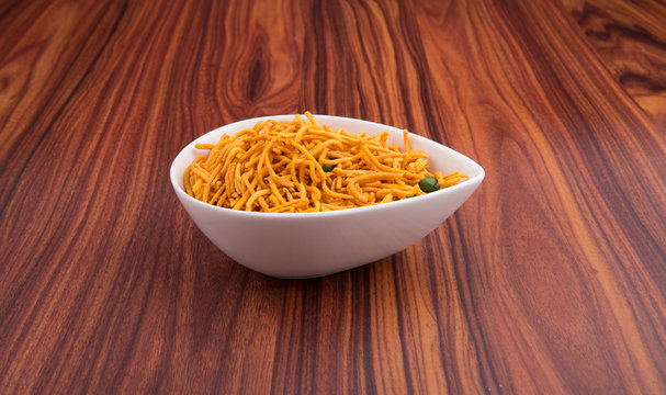 murukku or traditional indian snack chakli and chakali on background.