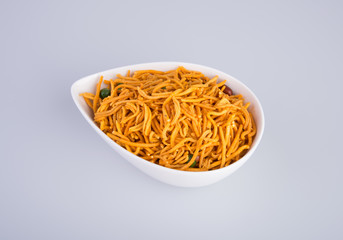 murukku or traditional indian snack chakli and chakali on background.