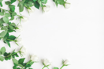 Flowers composition. Frame made of fresh rose flowers. Flat lay, top view, copy space